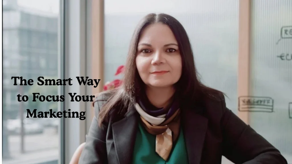 Female founder planning marketing strategy at minimalist desk with notebook and natural light